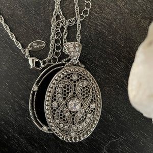 Lia Sophia faux locket.